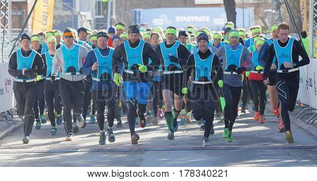 STOCKHOLM SWEDEN - MAR 25 2017: Running people after the start in the Stockholm Tunnel Run Citybanan 2017. March 25 2017 in Stockholm Sweden