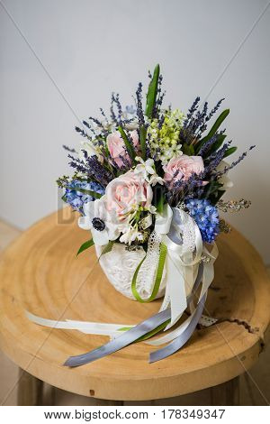 Beautiful aster flower bouquet on wooden table