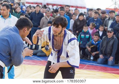 Shymkent, KAZAKHSTAN - 22 March 2017: Celebration of the Kazakh holiday NARIYZ. Competition wrestlers .
