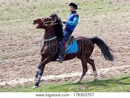 Shymkent, KAZAKHSTAN - 22 March 2017: Celebration of the Kazakh holiday NARIYZ. Competitions on horses .