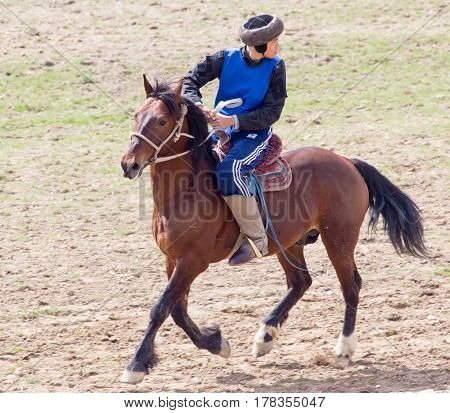 Shymkent, KAZAKHSTAN - 22 March 2017: Celebration of the Kazakh holiday NARIYZ. Competitions on horses .