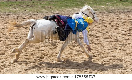 Shymkent, KAZAKHSTAN - 22 March 2017: Celebration of the Kazakh holiday NARIYZ. Competitions on horses .