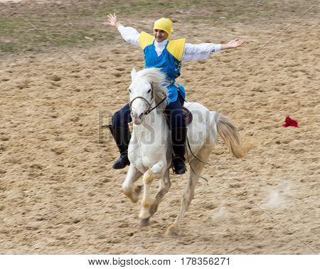Shymkent, KAZAKHSTAN - 22 March 2017: Celebration of the Kazakh holiday NARIYZ. Competitions on horses .