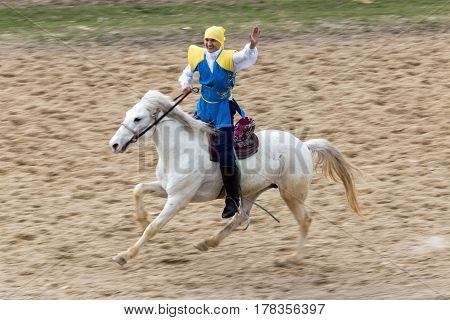 Shymkent, KAZAKHSTAN - 22 March 2017: Celebration of the Kazakh holiday NARIYZ. Competitions on horses .