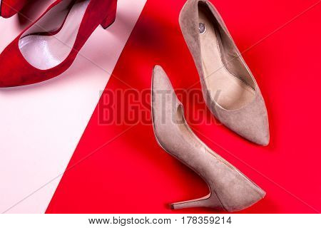 Fashion. Red and pastel female high-heeled shoes. Stylish Trendy heels Summer fashion girl Outfit Luxury Party shoes accessories. Hipster Essentials. Minimal fashion concept