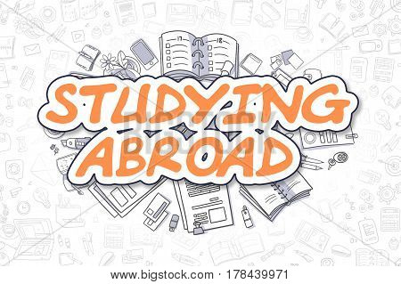 Studying Abroad - Sketch Business Illustration. Orange Hand Drawn Word Studying Abroad Surrounded by Stationery. Doodle Design Elements.