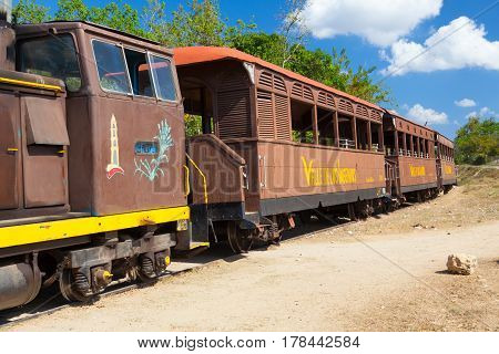 Manaca Iznaga Cuba - January 29 2017: Tourist train in the Valley of the Sugar Mills or Valle de los Ingenios a Unesco World Heritage site and a major tourist landmark in Cuba