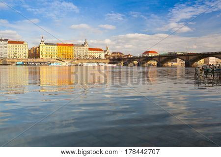 Prague Czech Republic - March 20 2017: View on the Prague panorama with Palacky bridge at sunset.The Prague bridges arching over the Vltava River are not only vital connecting links but also valuable works of architecture .