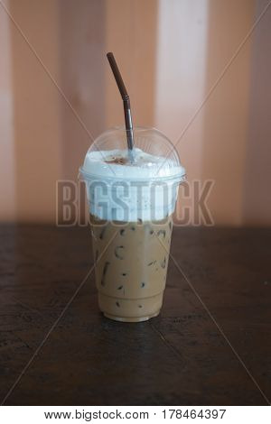 Iced mocha with straw in plastic cup ice coffee
