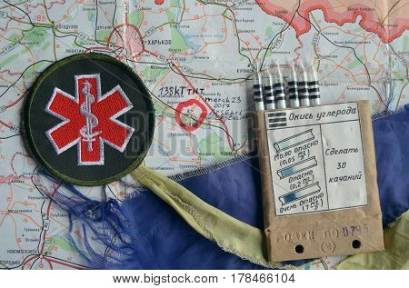 Chevron of Ukraine army.Back-Map of Ukraine  with location of Balakleya .Place of arsenal explosion at 23 march. 138 kT. of TNT power.March 23 ,2017 in Kiev, Ukraine