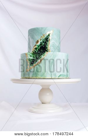 Wedding Cake Decorated Like Stone Marble With Emeralds In Cut