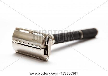 Traditional double edge safety razor isolated on white background