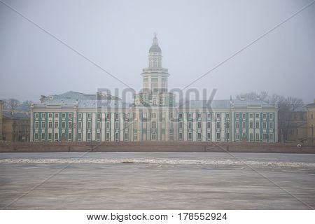 Building of the Kunstkammer in the March fog. Saint Petersburg, Russia