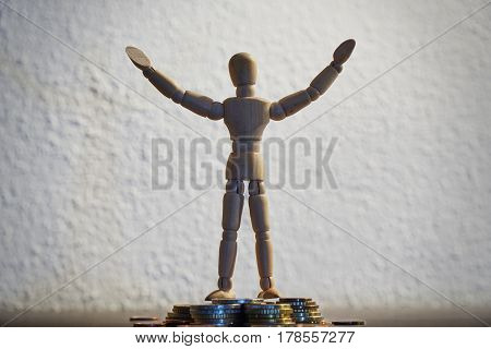 rich mannequin, puppet, symbol for might and power