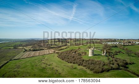 Aerial view over the Essex countryside with the 13th Century ruins of Hadleigh Castle in view.