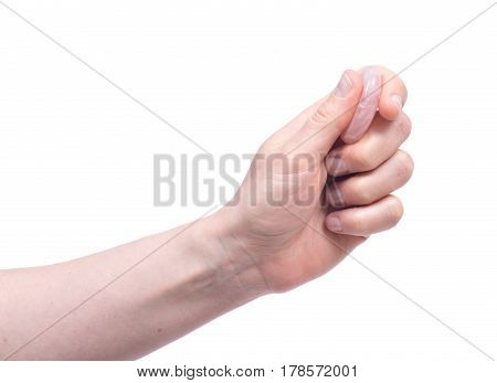 Young woman's hand holding rose quartz worry stone isolated on white background