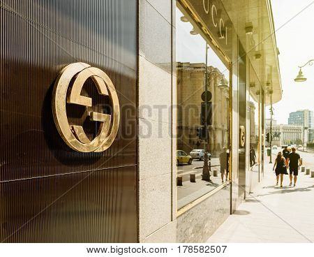 BUCHAREST FRANCE - APR 1 2016: Gucci sign logo on fashion store official boutique flagship store in Bucharest. Gucci is a luxury brand known for modern Italian-crafted leather goods apparel & accessories for men & women