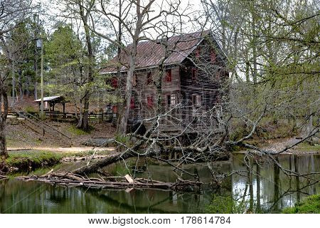 Childersburg Alabama USA - March 25 2017: Springtime at Kymulga Park. Kymulga Grist Mill on the banks of Talledega Creek is orginal to the Civil War period.