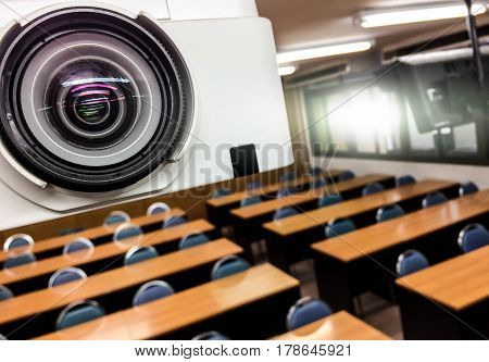 White projector in classrooms with black chairs create a full arrangement image blur on summer