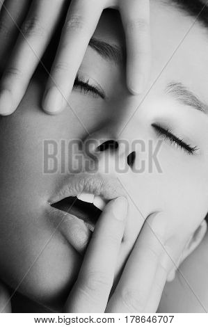 Portrait of a black and white girl with eyes closed