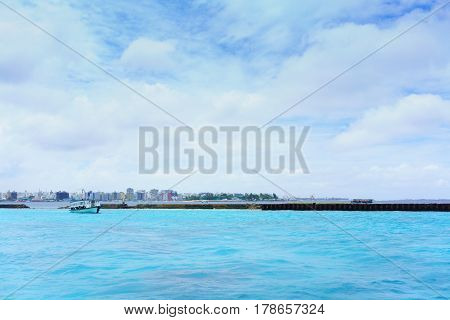 Boats from hotel coming to pick up tourists at Maldives Ports Maldives Island