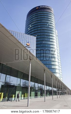 utrecht Netherlands 15march 2017: man walks in front of rabobank head office in dutch town of utrecht in the netherlands