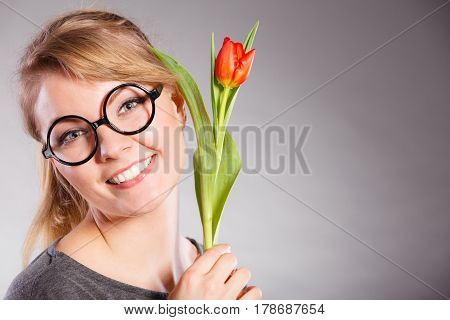 Beauty Woman With Tulip Flower.