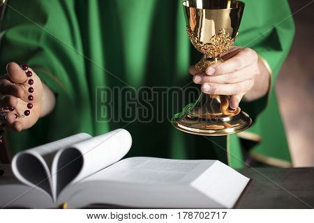 Catholic religion theme. Catholic priest during Holy Mass.