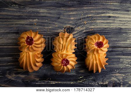 Cookies kurabe on a wooden table in a rustic style.