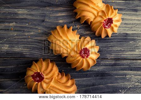 Cookies kurabe on a wooden table in a rustic style.