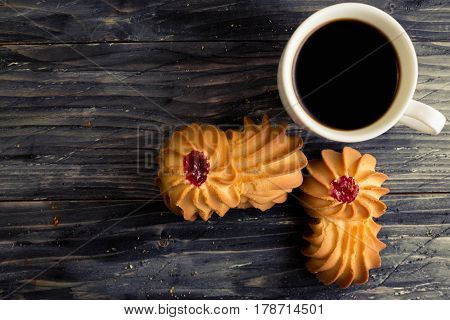 Cookies kurabe on a wooden table in a rustic style.