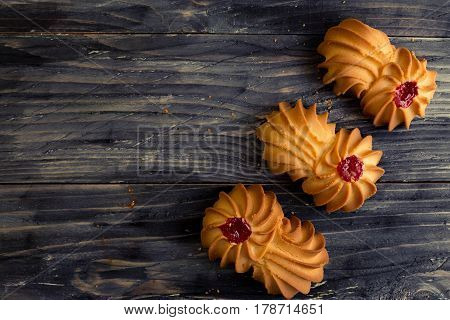 Cookies kurabe on a wooden table in a rustic style.
