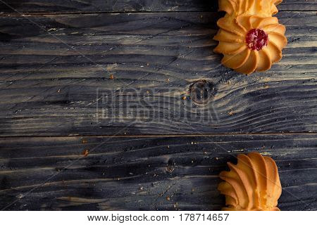 Cookies kurabe on a wooden table in a rustic style.