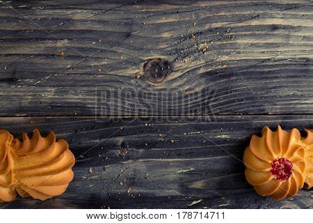 Cookies kurabe on a wooden table in a rustic style.