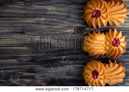 Cookies kurabe on a wooden table in a rustic style.