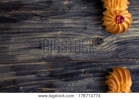 Cookies kurabe on a wooden table in a rustic style.