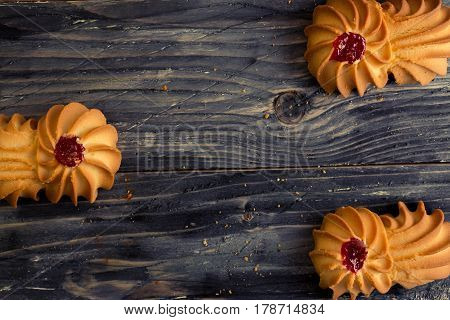 Cookies kurabe on a wooden table in a rustic style.