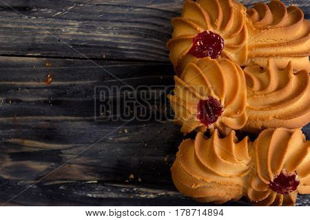 Cookies kurabe on a wooden table in a rustic style.