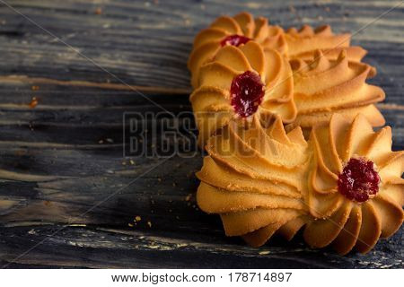 Cookies kurabe on a wooden table in a rustic style.