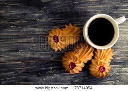 Cookies kurabe on a wooden table in a rustic style.