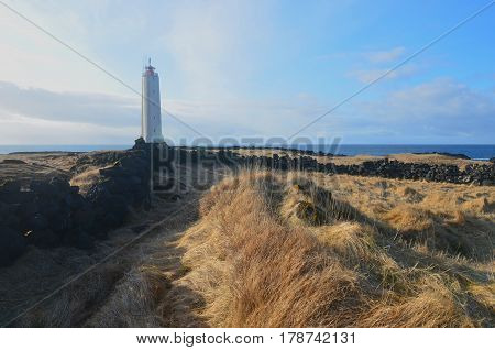 Rocky rugged fields near Malarrif Lighthouse on Snaefelssnes Peninsula in Iceland.