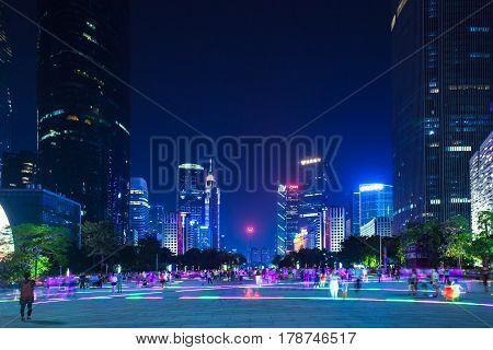GUANGZHOU CHINA - OCTOBER 4: Dusk view of the Flower Square and modern skyscrapers in Guangzhou downtown China on Octover 4 2016.