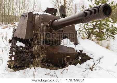 Rusty metal tank or gun in Chernobyl in the Exclusion zone in the Ukraine in wintertime.
