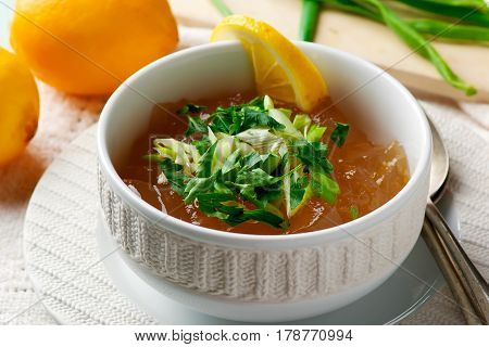 Consomme broth traditional French broth. selective focus