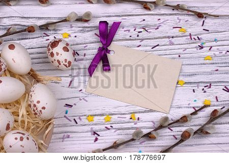 Easter Background With White Easter Eggs Pussy Willow Branches Purple Ribbon And Space For Text.