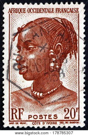 FRENCH WEST AFRICA - CIRCA 1947: a stamp printed in the France shows Agni Woman Ivory Coast circa 1947
