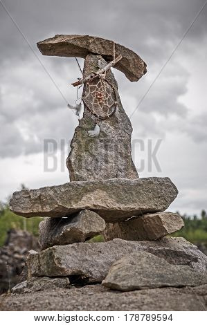Dreamcatcher On A Pyramid Of Stones