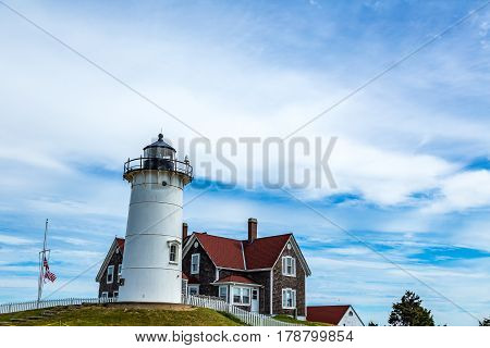 Nobska Light or Nobsque Light also known as Nobska Point Light is a lighthouse located at the division between Buzzards Bay and Vineyard Sound in Woods Hole Massachusetts on the southwestern tip of Cape Cod Massachusetts.