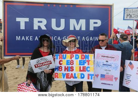 Huntington Beach, CA - March 25 2017: Make America Great Again March. Thousand of Supporters of republican president Donald Trump, march and wave flags, at a MAGA March in Huntington Beach. 





