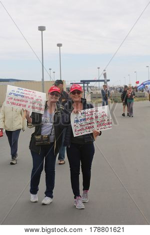 Huntington Beach, CA - March 25 2017: Make America Great Again March. Thousand of Supporters of republican president Donald Trump, wear T-Shirts march and wave flags, at a MAGA March. 




